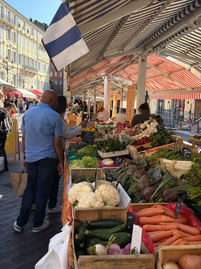Cours Saleya flower and vegetable market stalls in Nice