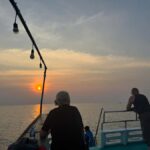 From Phu Quoc: Sunset and Night Squid Fishing - A Scenic Welcome: Hotel Pickup and Beginning the Cruise