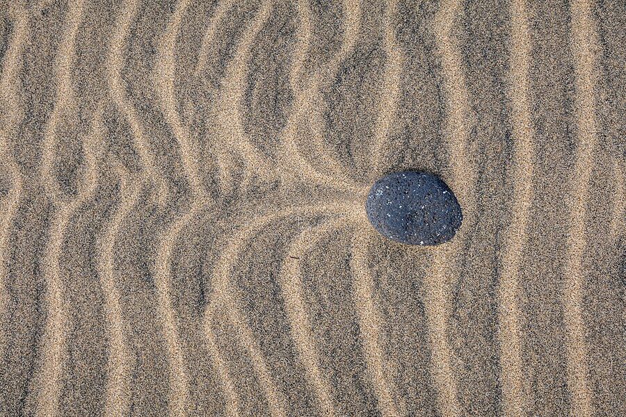 Multi-coloured sand structures on the beach at Morro Jable, Fuerteventura