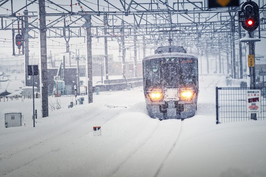 Train running with Mount Fuji in background