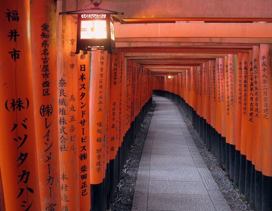 Orange torii gate corridor at Fushimi Inari Taisha shrine in Kyoto