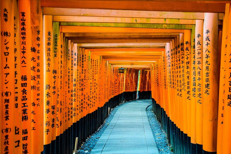 Looking through the iconic orange torii tunnel at Fushimi Inari Taisha