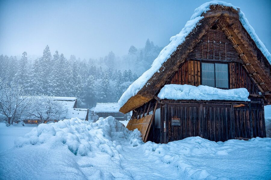Close-up of a gassho-zukuri thatched roof house in Shirakawa-go showing traditional Japanese architecture