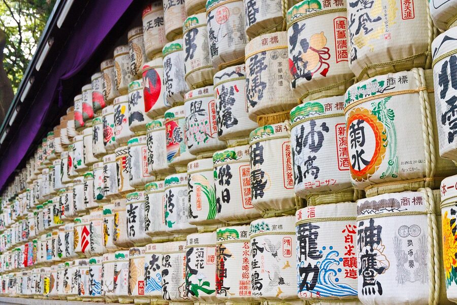 Traditional sake barrels displayed along the path to Meiji Shrine in Tokyo