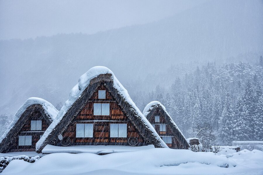 Gassho-zukuri houses blanketed in heavy snow during winter in Shirakawa-go Japan