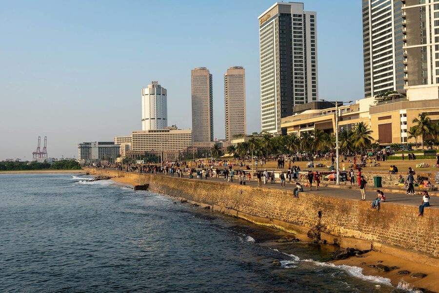 Galle Face Green promenade with visitors walking along the Colombo seafront