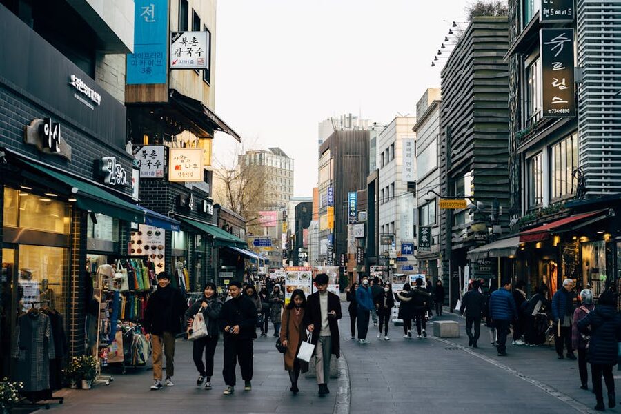 Lively shopping street in Seoul Gangnam with pedestrians