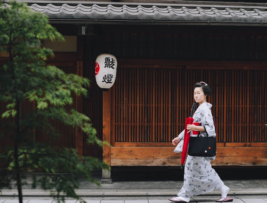 Geisha in kimono on Kyoto traditional street