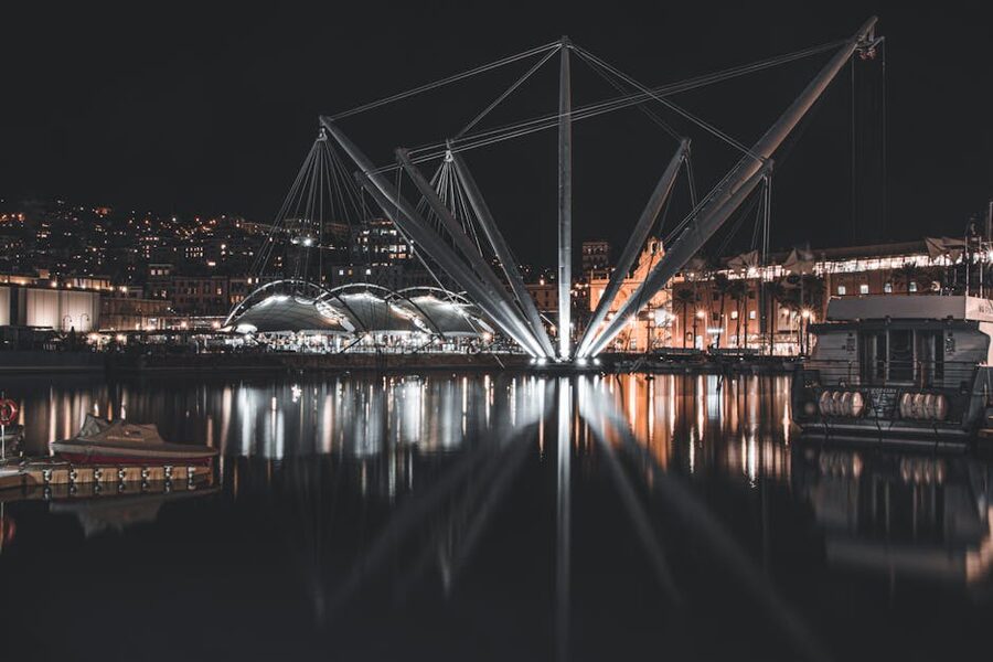 Genoa Aquarium harbour at night with Bigo lift reflected