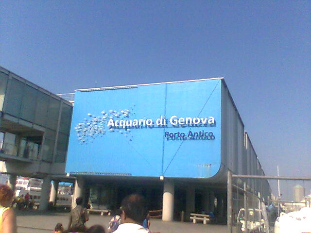 Exterior view of the Genoa Aquarium building from the harbour