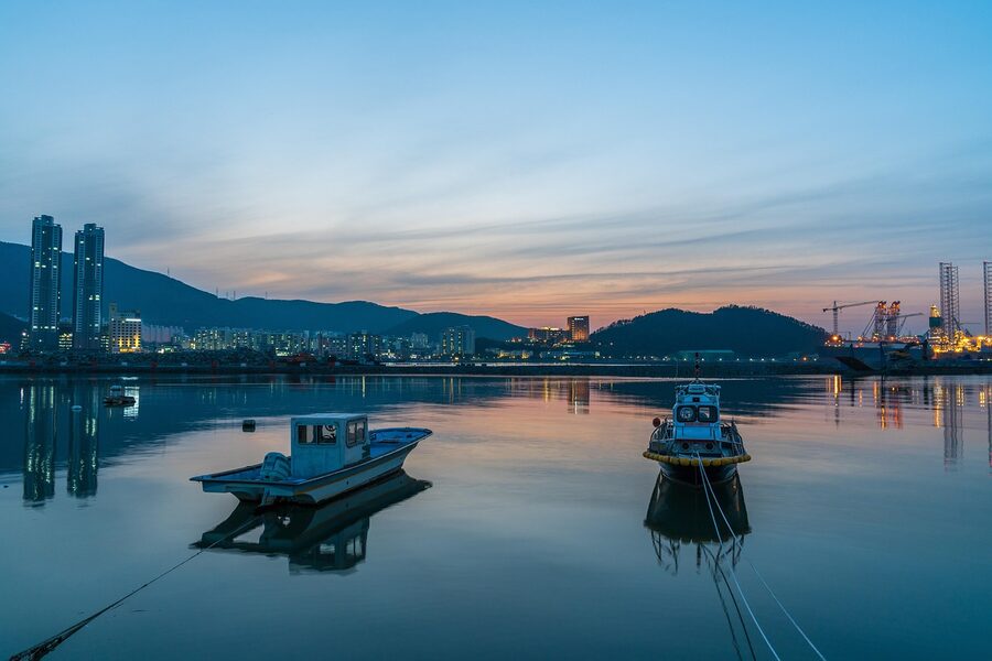 Sunset over fishing boats at Gohyeon port on Geoje