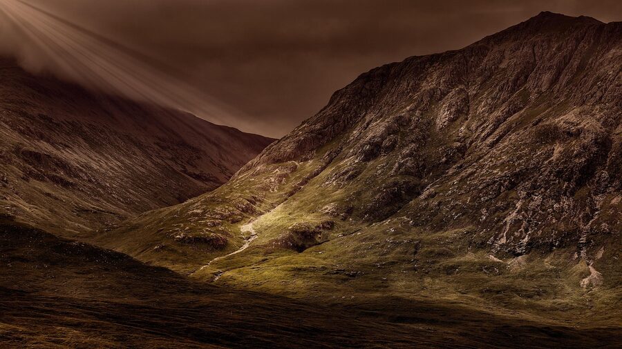Glencoe valley sunlight panorama Scottish Highlands