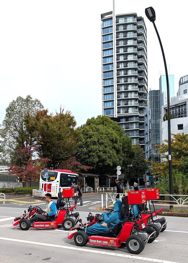 Go-kart riding through Shibuya Tokyo street