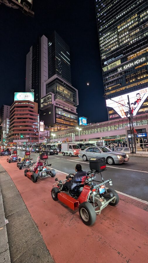 Go-karts driving through Tokyo city streets