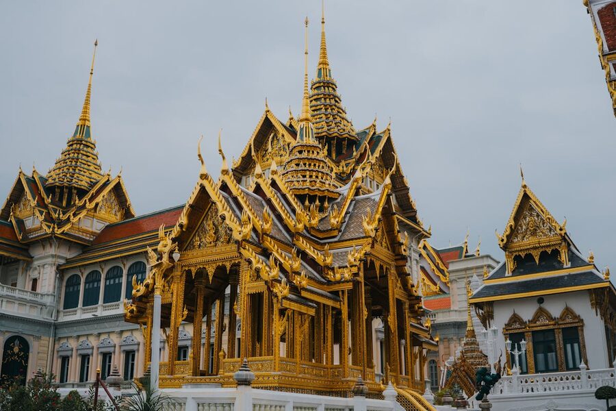 Golden spires and ornate architecture of the Grand Palace in Bangkok Thailand