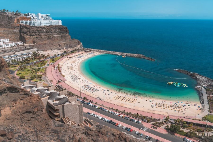 Aerial view of Playa de Amadores beach Gran Canaria with turquoise sea