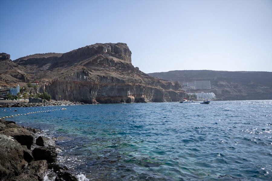 Mogan rocky coastline under clear blue sky Gran Canaria