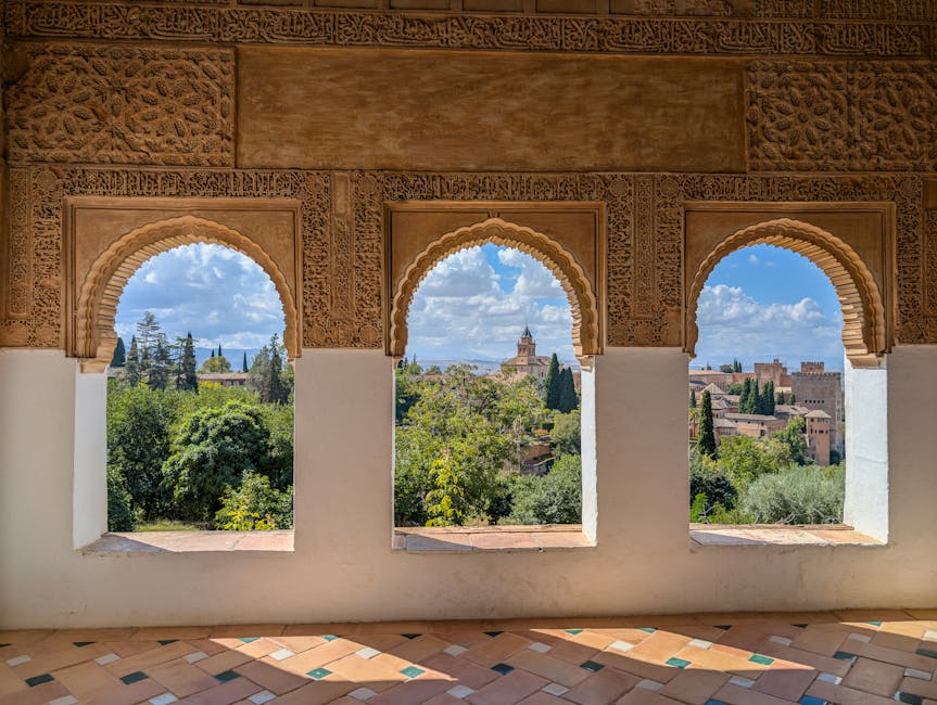 View through Alhambra arches over Granada