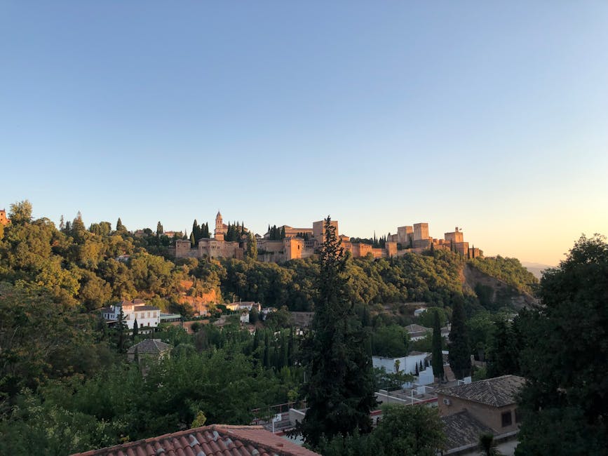 Alhambra fortress with greenery at sunset