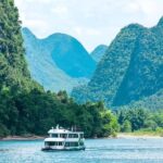 Guilin: 3-Day Yangshuo Cruise & Bamboo Raft Tour - Day Two: Scenic Cycling, Cultural Exploration, and Cave Wonders