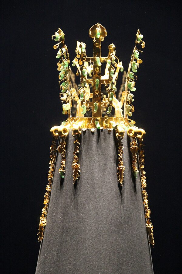 Silla Kingdom gold crown artifact with jade pendants on display