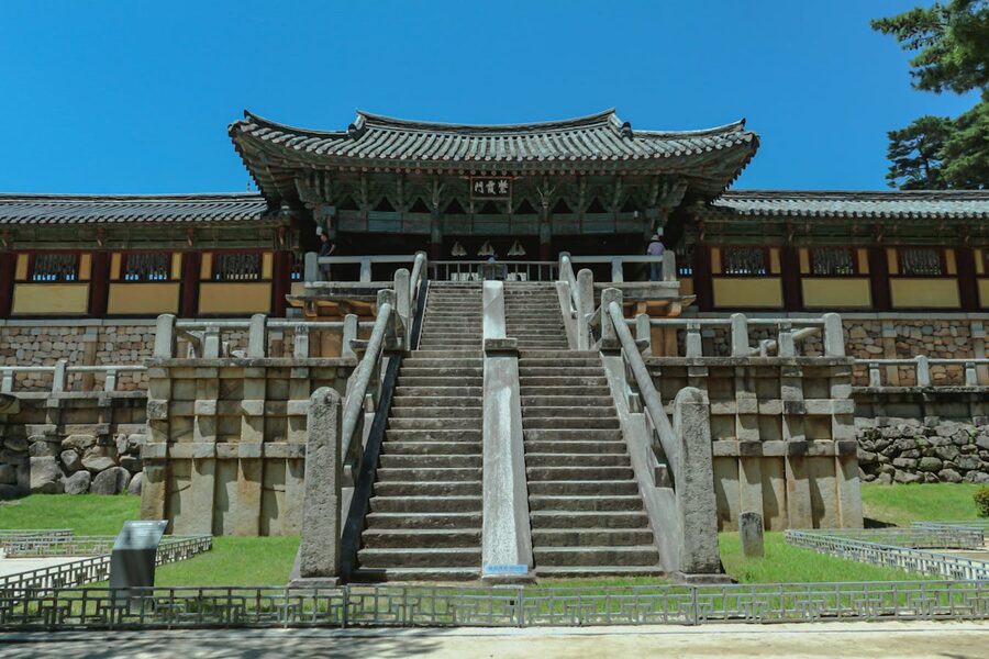 Ancient Korean temple rooftops with autumn colors in Gyeongju