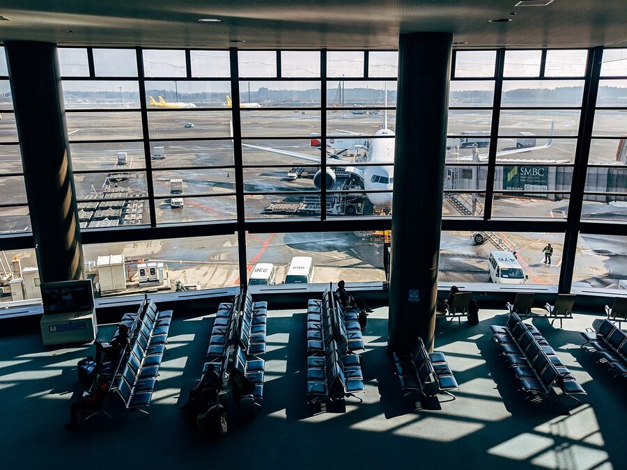 Haneda Airport terminal interior with airline information