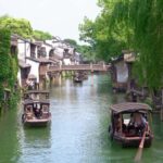 Hangzhou: Wuzhen & Nanxun Town Tour with Tea & Pingtan - What Makes This Tour Stand Out