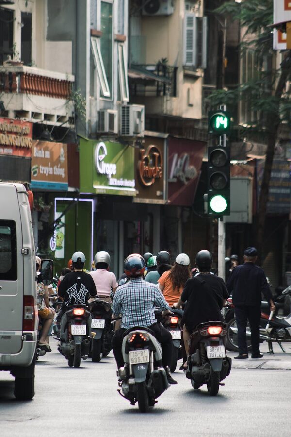 Motorbikes stopped at a traffic light in Hanoi