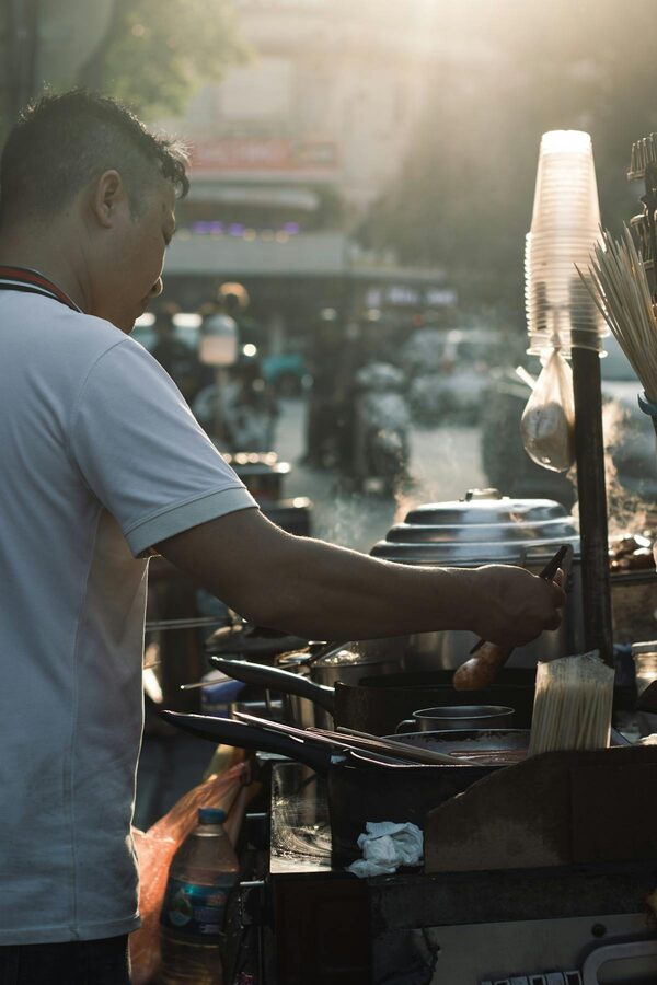 Fresh ingredients displayed at a Hanoi street food stall