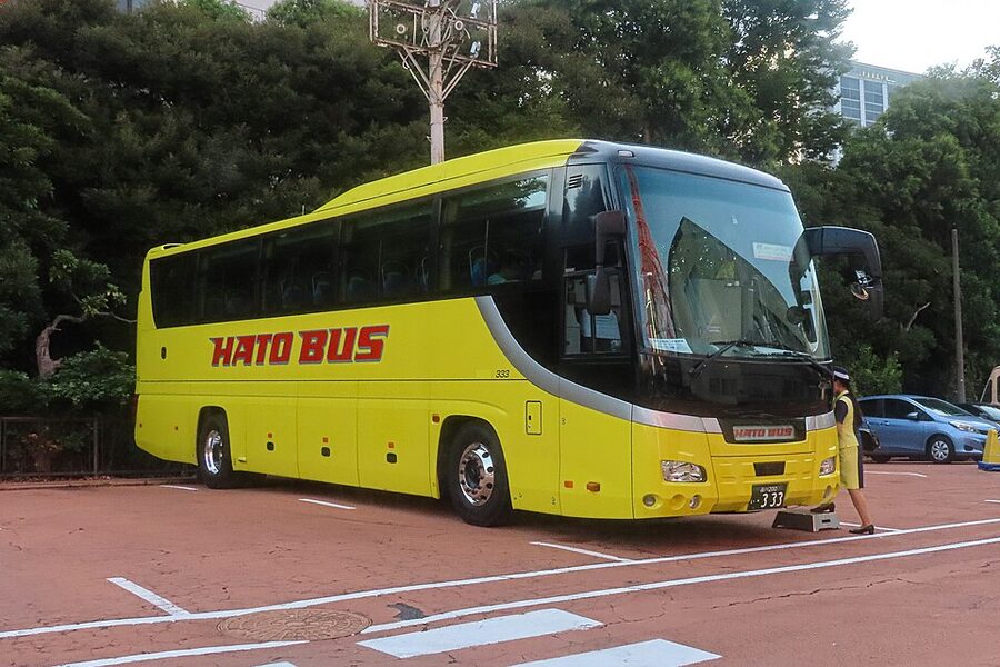 Hato Bus sightseeing coach parked at Tokyo Tower