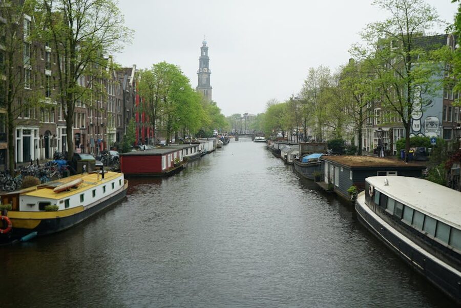 Morning view of an Amsterdam canal with houseboats