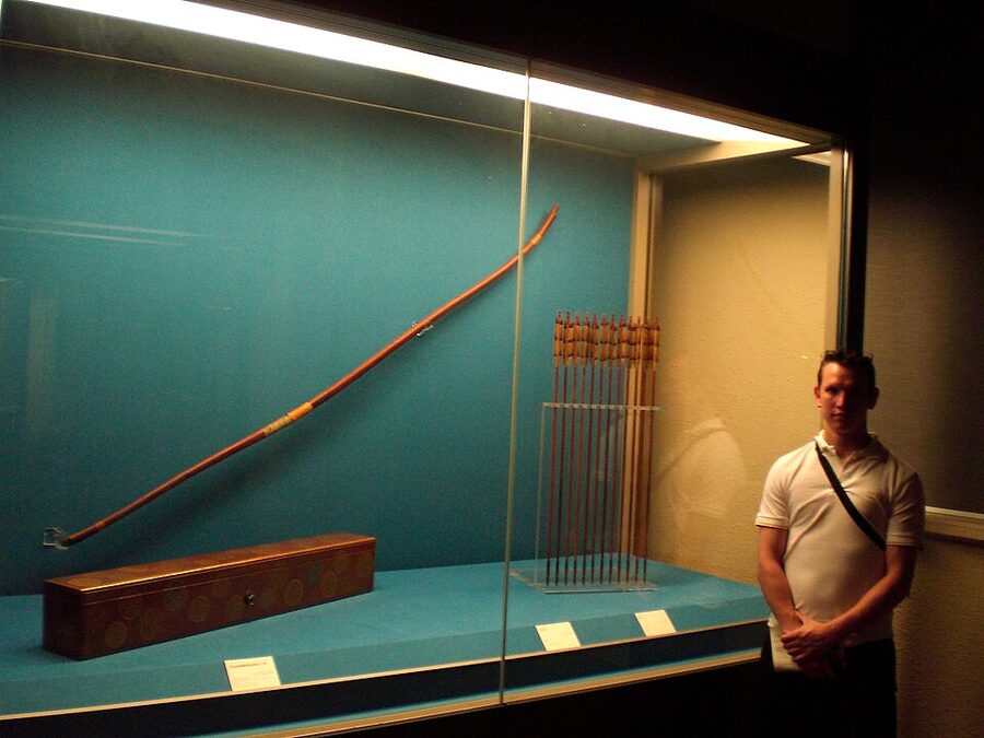 Antique Japanese yumi bow and ya arrows laid out