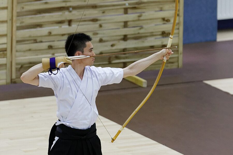 Kyudo archer at full draw holding the position