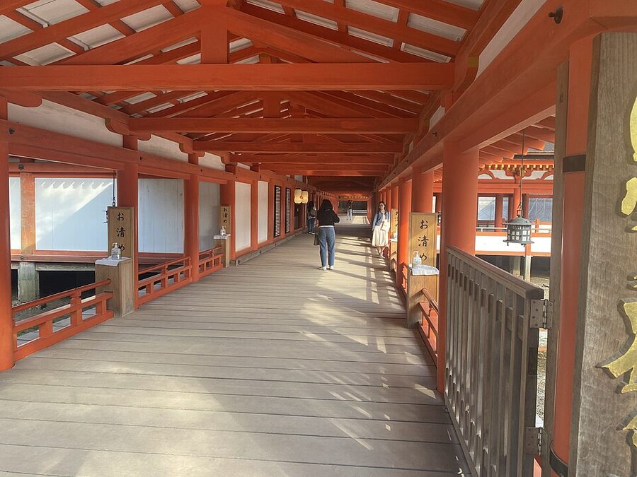 Itsukushima Shrine wooden corridor over the sea at high tide Miyajima