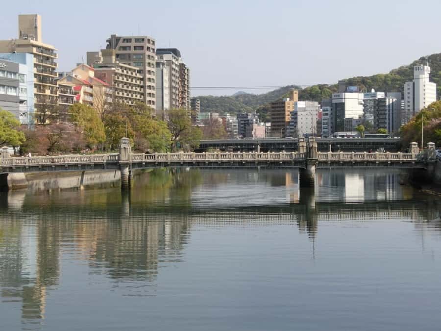 Hiroshima Waterways & Retro Street on a Guided Tour Walk - Vintage Tram Ride: Riding Hiroden