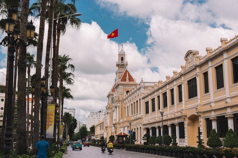Ho Chi Minh City Hall with Vietnamese flag