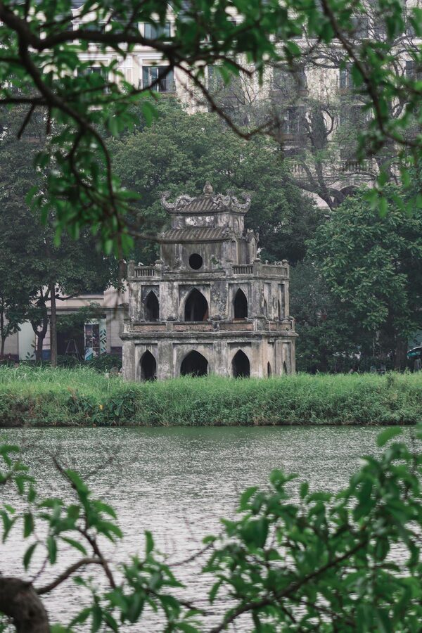 View of Hoan Kiem Lake with the red bridge and Ngoc Son Temple in Hanoi