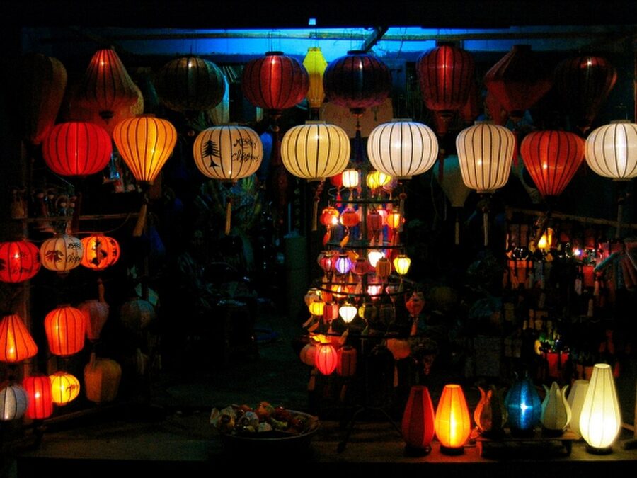 Traditional Hoi An lanterns illuminated at night along a street