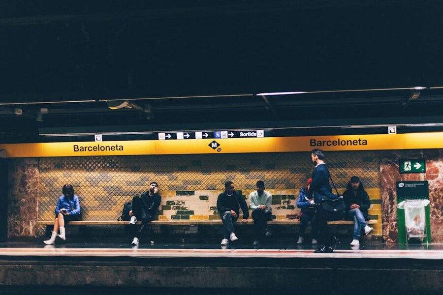 Commuters waiting at Barceloneta metro station Barcelona