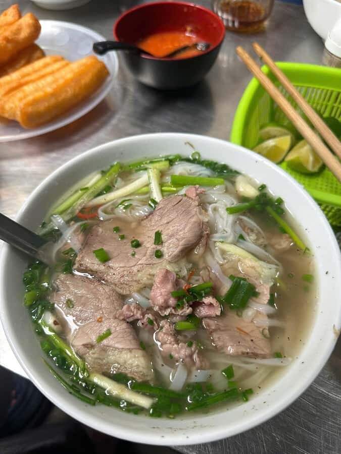 (HOT) Hanoi Guided Food and Train Street Tour with Local - Starting Point: Nhà Hát Múa Rối Thăng Long