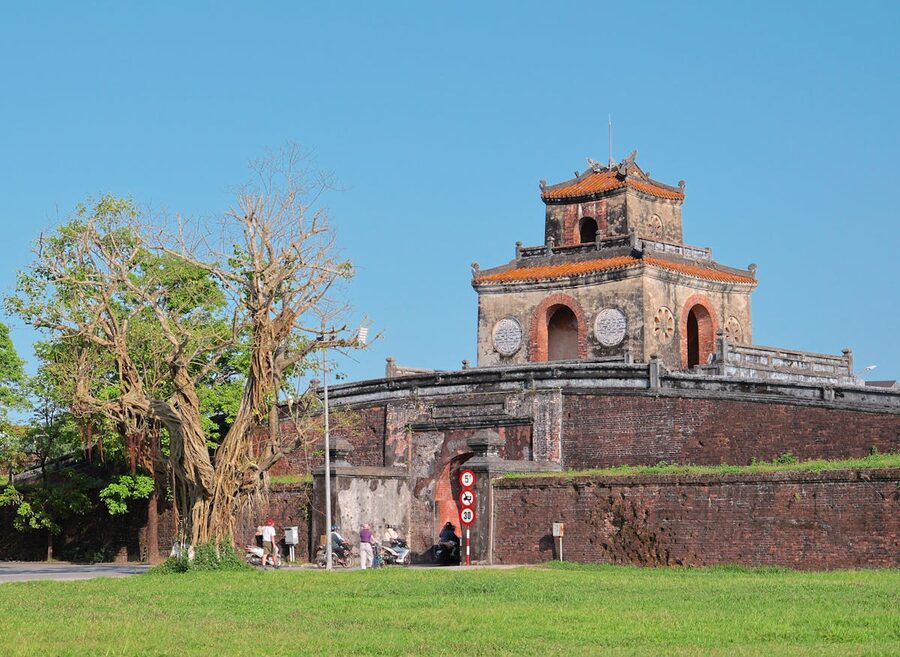 Historic flag tower and citadel walls in Hue Vietnam