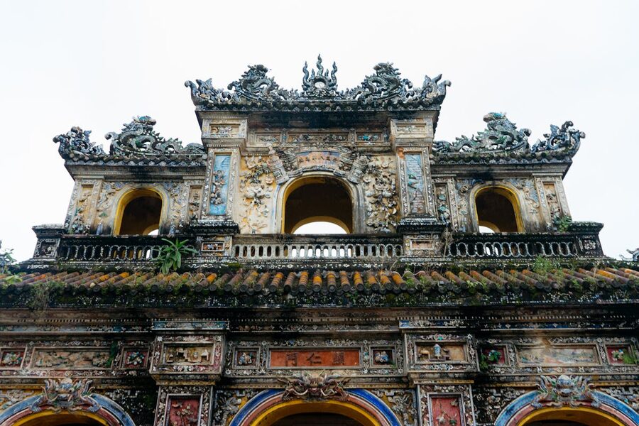 Detailed ornamental gate inside the Imperial City of Hue