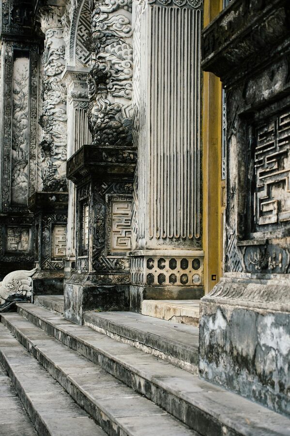 Ornate facade of Khai Dinh Tomb in Hue with detailed mosaic work