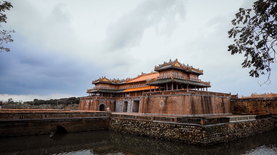 Detailed interior architecture with ornate designs at the Imperial City of Hue