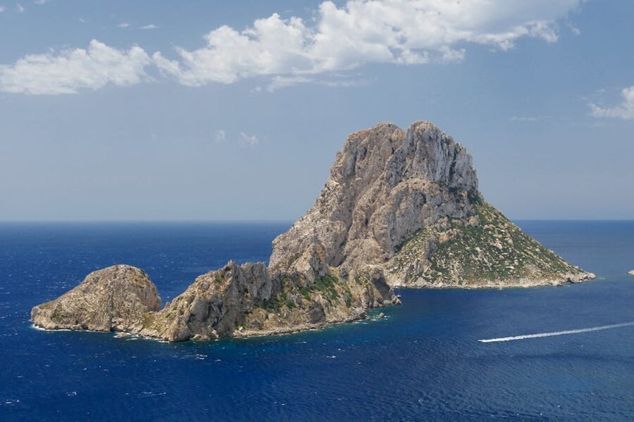 Aerial view of Es Vedra island Ibiza surrounded by Mediterranean Sea