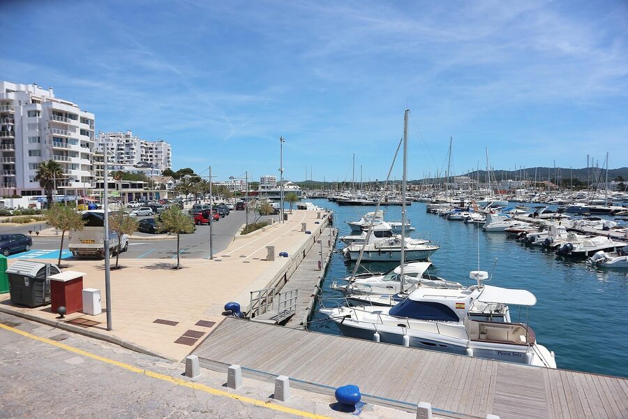 Sant Antoni port Ibiza with sailing boats and Mediterranean coast