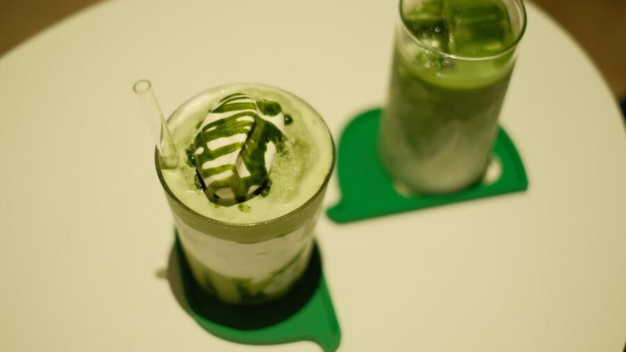 Iced matcha lattes with cream drizzle
