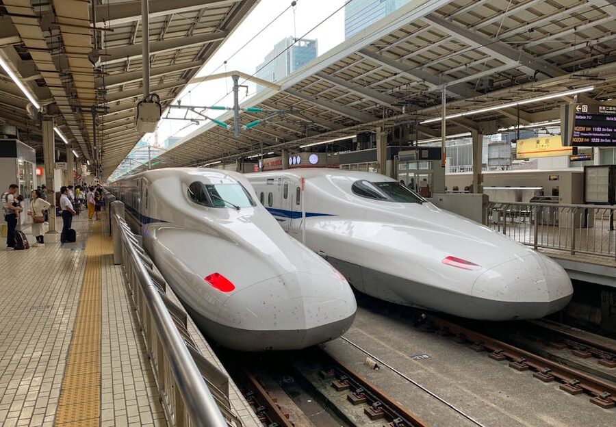 Two Shinkansen bullet trains at Tokyo Station platform