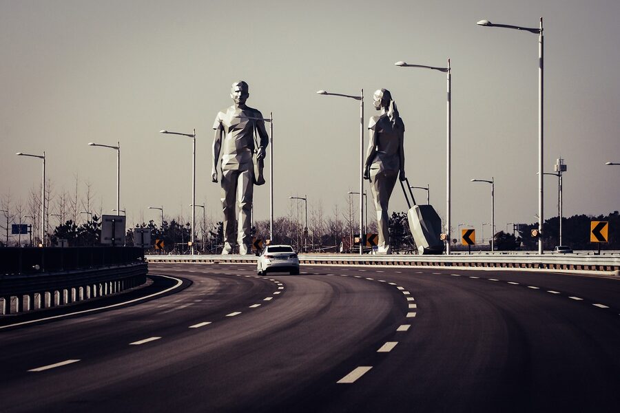 Highway approaching Incheon International Airport with large character signage